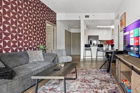 Gorgeous 3 bedroom, 2 bathroom apartment complete with a full kitchen, Living Area, AC, desk, TV, washer/dryer, balcony, & much more!