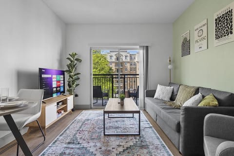 Delightful 4 bedroom, 2 bathroom apartment complete with a full kitchen, Living Area, AC, desk, TV, washer/dryer, balcony, & much more!