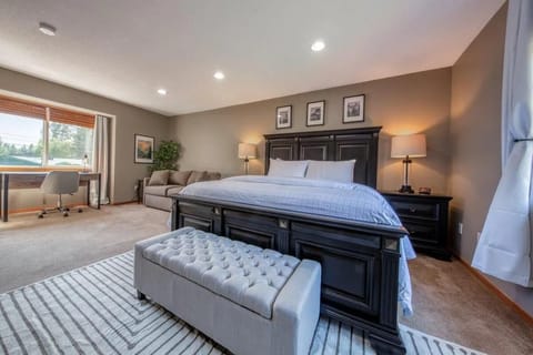 Main Bedroom: King bed, Twin bed with Trundle pull out, Desk and 65" TV.   