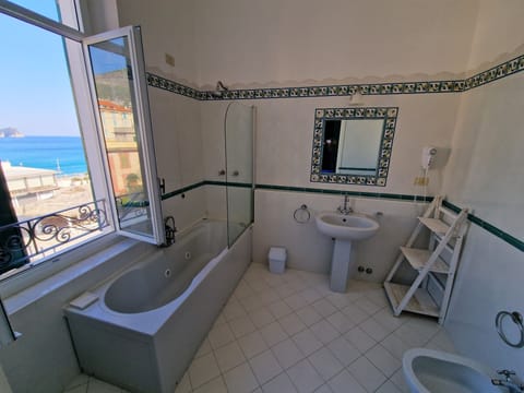 Double Room, Sea View | Bathroom | Hair dryer, bathrobes, bidet, towels