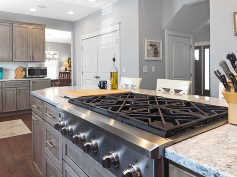 Stove top in the stocked kitchen