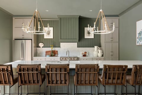 Chef’s Kitchen | First Floor | Fully Equipped | Electric Range | Bar Seating | Open Access to Dining Area |