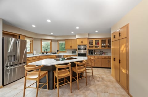 A convenient bar counter provides a casual spot for meals or drinks.