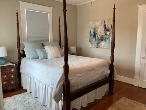 queen four poster bed in front bedroom