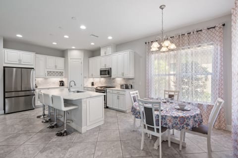 Large, fully stocked kitchen and breakfast area. 
