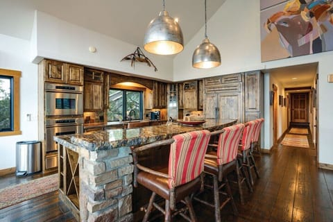 Gourmet Kitchen with 12 foot Island & bar