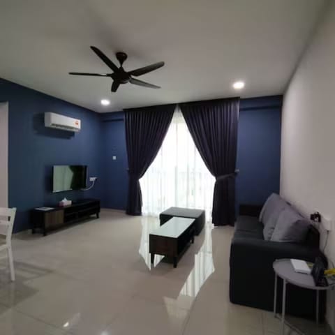 Apartment | Living area | 27-inch Smart TV with satellite channels