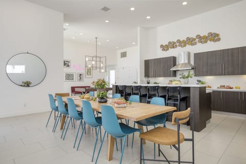 Plenty of seating between the dining table and the counter.