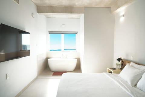 Premium Suite, Ocean View | Egyptian cotton sheets, premium bedding, pillowtop beds, minibar