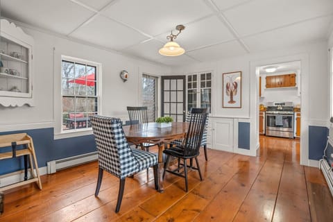 Share a meal around the dining table with seating for four.