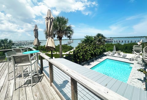 Waterfront rooftop deck overlooking the saltwater pool