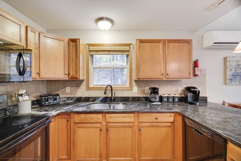 A fully equipped kitchen with ample cabinets for all your cooking needs.