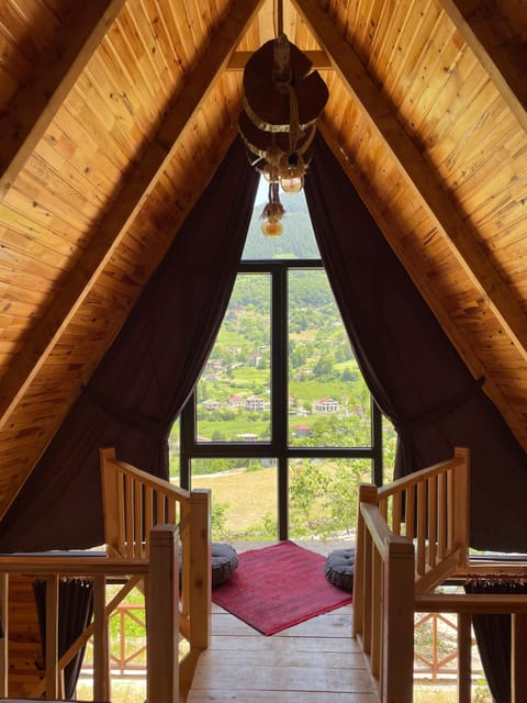 Deluxe Bungalow | Living area | Flat-screen TV, fireplace