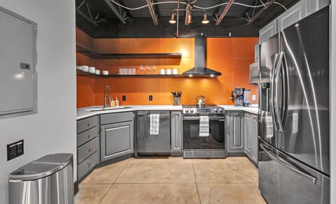 Cook like a chef in this fully equipped kitchen, featuring top-of-the-line appliances and ample counter space for culinary creativity.