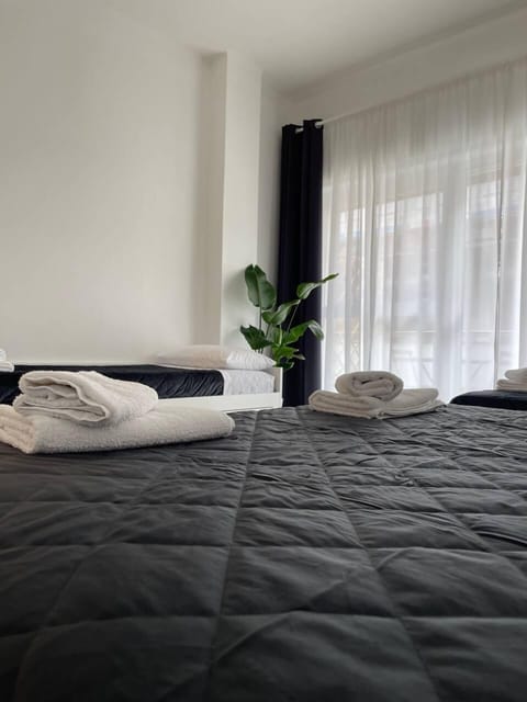 Family Room, City View | Down comforters, desk, laptop workspace