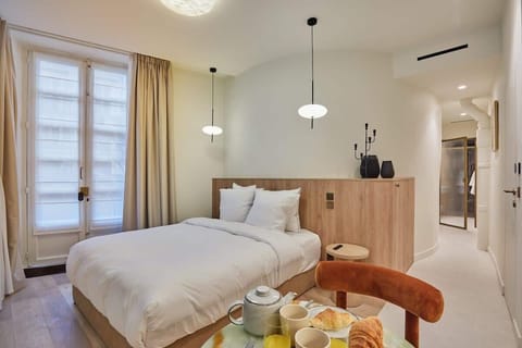 Espace Chambre lit queen Size
