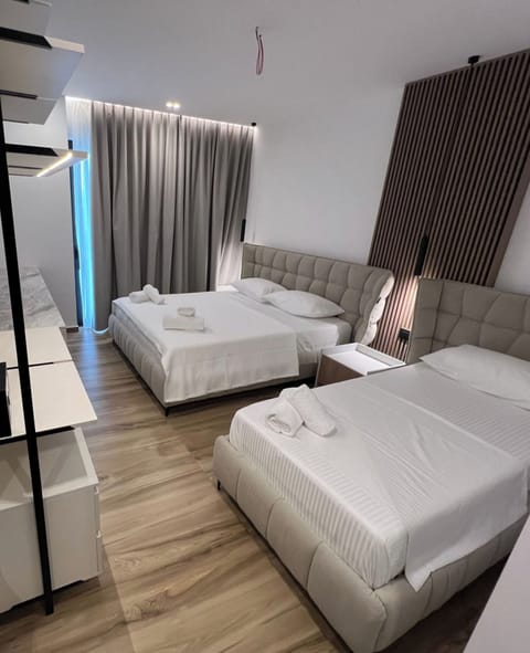 Deluxe Triple Room, Balcony | Free WiFi