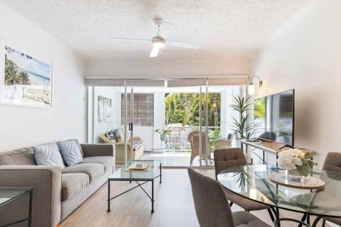 The living area has a cosy lounge sitting adjacent to the balcony entrance, so you can enjoy the comfort of fresh air and sunshine while you recline. 

