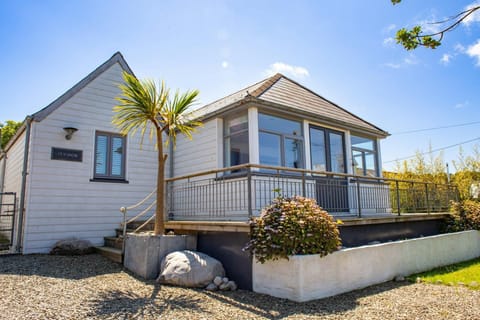 Front terrace. Gravel driveway
