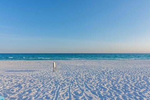 Spend your days on the emerald water and sugar-white sand of Miramar Beach.
