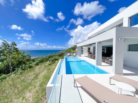 View of the pool terrace and the ocean