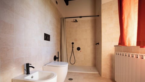 Standard Apartment | Bathroom | Hair dryer, towels, soap, shampoo