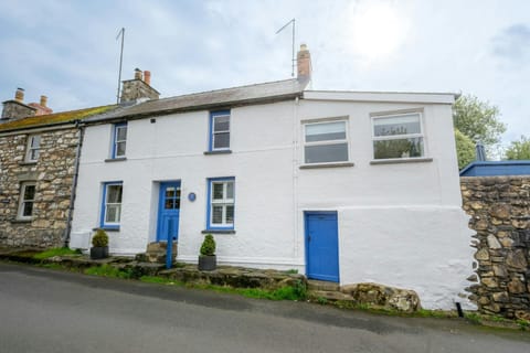 White washed front of the cottage