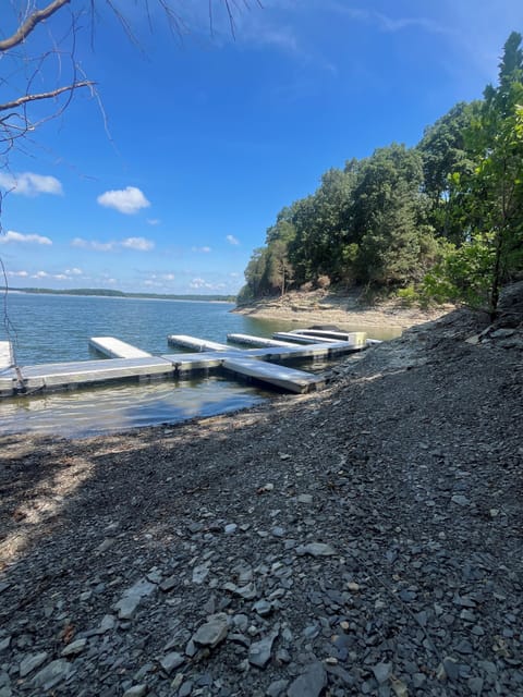 Lake access with Aluminum Dock and Boat Slip directly behind house.