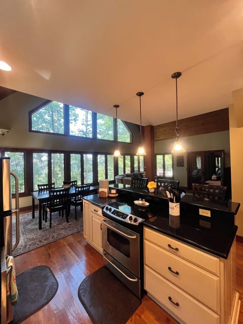 Dining table and bar provide seating for 8.