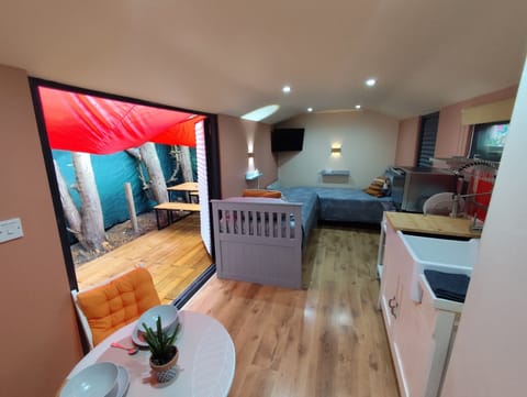 Premium Cabin, 2 Twin Beds, Kitchenette, Garden Area | Egyptian cotton sheets, premium bedding, minibar, blackout drapes