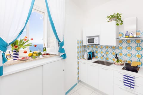 Panoramic House | Living area | 40-inch flat-screen TV with digital channels