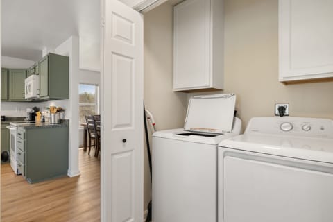Laundry room with washer and dryer for a hassle-free vacation.