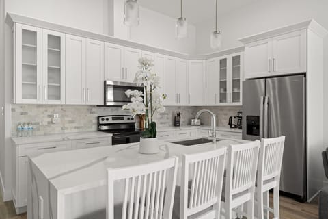 Stainless-steel appliances, coffee station, and everything you need for meals at home