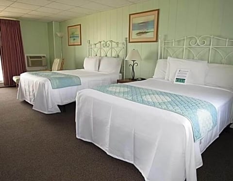 Room, 2 Queen Beds, Refrigerator, Beachfront | Free WiFi, bed sheets
