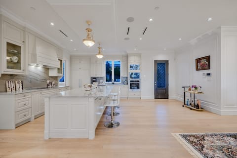 Kitchen opens to the backyard