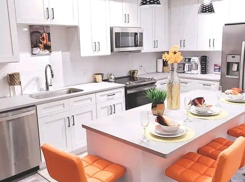 Luxury Apartment | Private kitchen | Cleaning supplies, paper towels