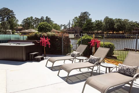 Comfortable lounge chairs by the pool. There are more available in the garage