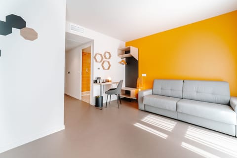 Family Room | Desk, laptop workspace, blackout drapes, iron/ironing board