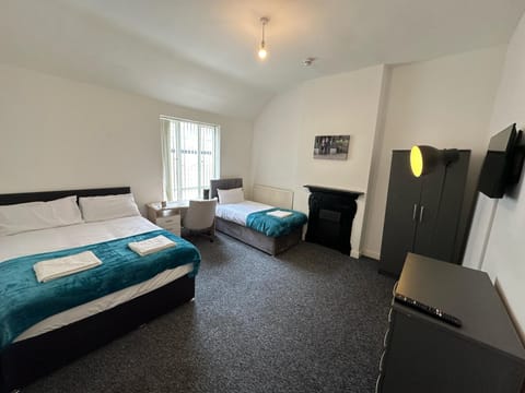 Family Room, Multiple Beds, Non Smoking, Shared Bathroom | Free WiFi