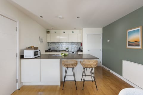 Dishwasher, Coffee machine and microwave in kitchen area - Dining area - 6 The Point, Pentire