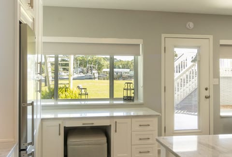 Desk area in kitchen, marina view