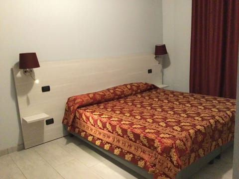 Basic Room, City View | 1 bedroom, in-room safe, blackout drapes, free WiFi