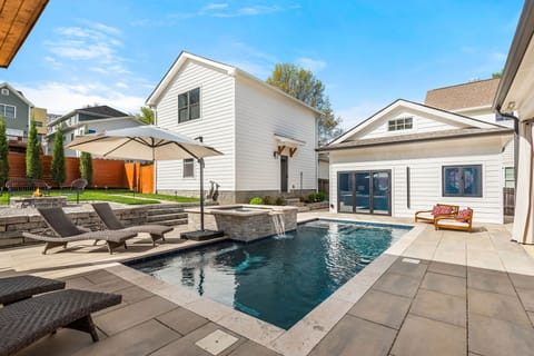 - Private backyard with refreshing pool and sun loungers  - Outdoor space designed for relaxing afternoons and easy vacation living  - Perfect for guests searching for a poolside retreat