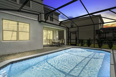 Enjoy a lovely evening outside by the pool!
