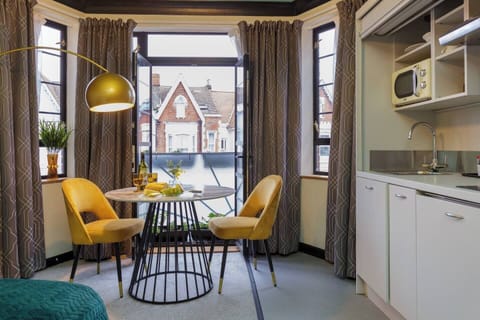 Dining Nook: Brighten up your mornings with views and stylish seating for two!