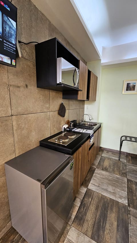 Microwave, coffee/tea maker, cookware/dishes/utensils