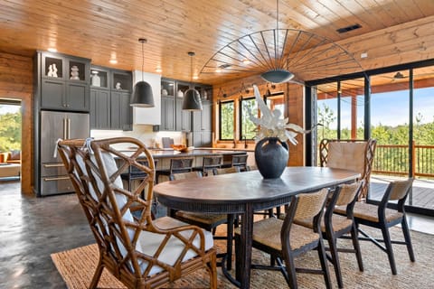 Dinner with a Breeze - Gather around the table for a meal or a chat, with seamless access to fresh air and views.