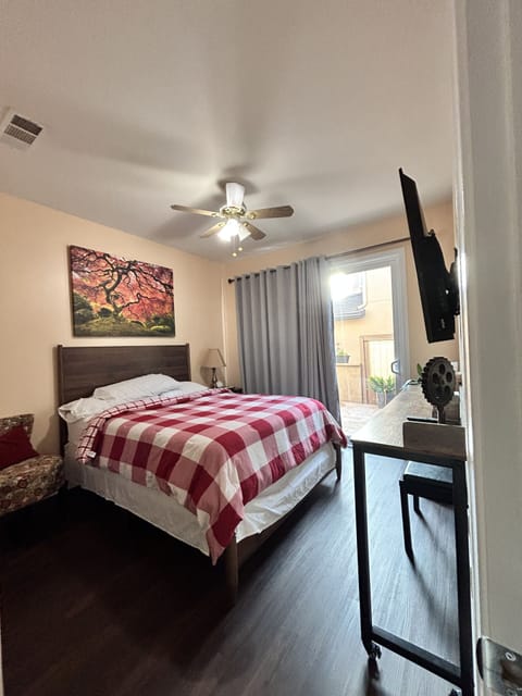 Queen bed, with cozy flannel comforter, provided with extra pillows