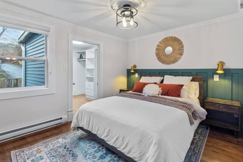 Bedroom 1: Cozy bedroom, complete with soft, fresh linens and plush towels to ensure your comfort throughout your stay.