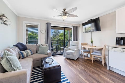 Comfortable modern furniture adorn this beautiful beach condo